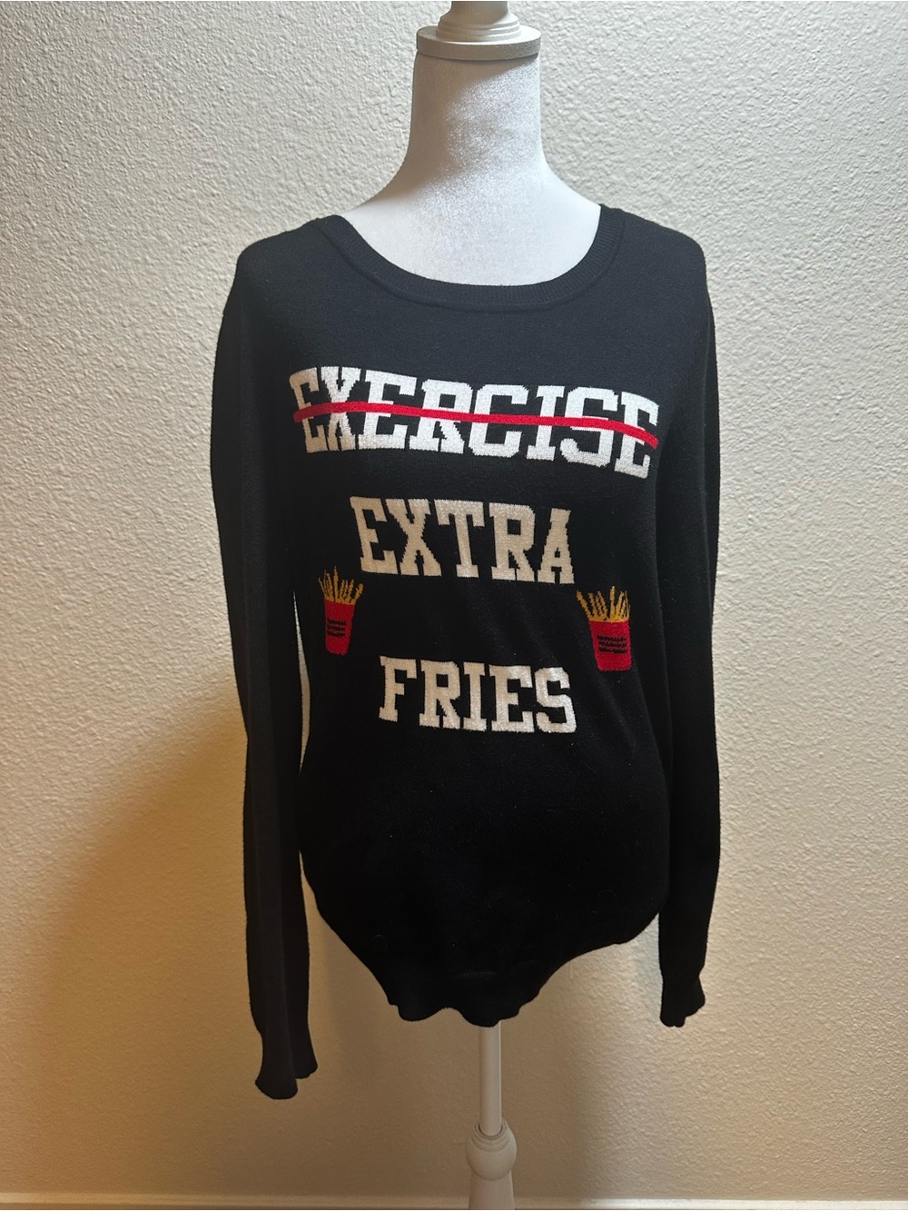 Black Sweatshirt with White Text and Red & Yellow Fry Accents